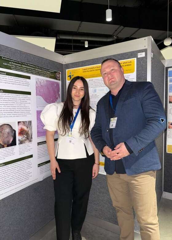 Vasyl Ostafiichuk and Yaroslava-Mariia Rishko with EADO 2026 posters in Prague